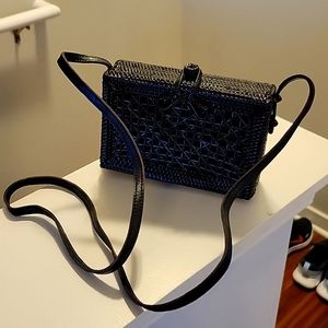 Black wicker-like purse